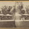 View of fountain and tents, Central Park, New York City.