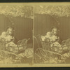 View of a child and a baby in a stroller.