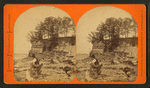 Man sitting on the Rocky river.