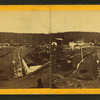 Gordon. [View of small town by railroad tracks.]