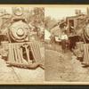 Locomotive and tender with engineer and other railroad men.]