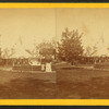 Decorated tent in recently landscaped park.