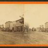 Main street, with shops and horse carriages, Girard, Pennsylvania.