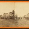 Main street, with shops and horse carriages, Girard, Pennsylvania.