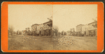 Main street, with shops and horse carriages, Girard, Pennsylvania.
