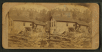 Residence of Captain West, showing debris drifted up on a back street.