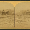 This view is looking toward the corners of Main and Clinton Streets, and shows the remains of the only buildings left standing on the one side of Clinton Street; also where stood the ill-fated Hulbert House where so many commercial men lost their lives.