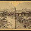 This view was taken after the debris was removed from above the bridge and shows the Cambria Iron Works in the distance.