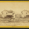 Group in front of ruined home, Johnstown, Pa.