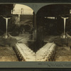 Front view of ladle emptying molten iron into moulds, pig iron machine, Pittsburg, Pa., U.S.A.