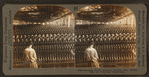 Spinning room. Winding bobbins with woolen yarn for weaving, Philadelphia.