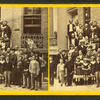 Group of adults and children on a stairway.