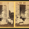 Family posing at the doorway.