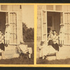 Family posing at the doorway.