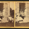 Family posing at the doorway.