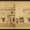 Family posing in front and in the porch of Stone House.