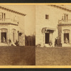 Family posing in front and in the balcony of Stone House.
