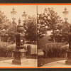 Light fixture and drinking fountain in the park.