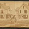 The Rectory. [Showing a group of adults and children on the porch of "Rectory"]