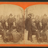 Group portrait of 3 men, 2 women and a boy.
