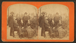 Group portrait of 3 men, 2 women and a boy.