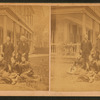 Group portrait of two men and three women taken in front of the porch.