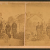 Group portrait of two men and three women taken in the garden.