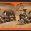 Men on railroad engine.