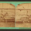 Punishment Horse Bridger" [showing soldier on wooden horse holding oversized wooden sword over his shoulder in front of log building].