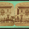 Ute Indians on the road to a grand pow-wow. Co-operative store for background.