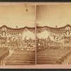 Interior view of hall ready for celebration with decorations reading "Good Luck."