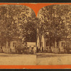 Adults and children in front of house, including view of a delivery wagon from "Hale & Reeves."