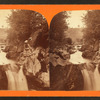 View of two ladies on the river (one with fishing pole).