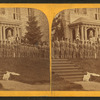 Cadets in front of stone building.