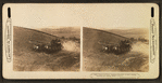 Twenty-six horse combined harvester at work, reaping, threshing and sacking, Wash., U.S.A.