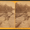 Breasting an oar, just to steady her. Coil of rope on the raft in the foreground.