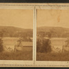 View of a bridge, river and mountain.