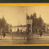 View of the lake and tourists in the boardwalk.