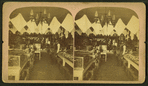 Interior view of W. L. Kidd's store in Laramie, showing wares in cases and hanging overhead.