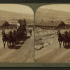 Six-horse tally-ho leaving mountain walled Gardiner for trip through Yellowstone Park, U.S.A.
