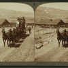 Six-horse tally-ho leaving mountain walled Gardiner for trip through Yellowstone Park, U.S.A.