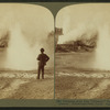 Glittering spray from 'Constant' Geyser, and steam from 'Black Growler,' Yellowstone Park, U.S.A.