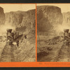 First construction train passing the palisades, Ten Mile Cañon.