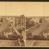 Train crossing through town.
