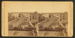 Train crossing through town.