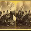 Crow Indian warriors. [Group posing in front of a teepee.]