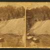 Mullen Tunnel Grade east approach [showing log cabin at the bottom of grade.]