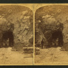 East entrance to Mullen Tunnel. [Men working at the entrance to the tunnel.]