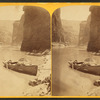 Marble Cañon, the cañon at noon. [Empty rowboat on the banks of the river.]