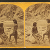 Types of Mojave Indians. [Two Mojave men pose on rocks in front of the river.]